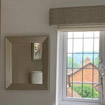 Fabric covered pelmets in beedroom