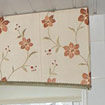 Curved pelmet in bathroom covered in customers own fabric
