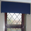 Fabric covered bumper pelmet in cloakroom