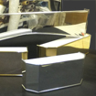 Mirror finish pelmets in silver and gold