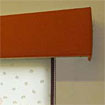 Fabric covered pelmet with piping on edges